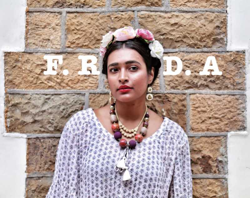 { E.D.I.T.O.R.I.A.L}  FRIDA
