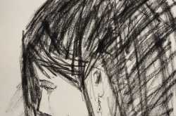 A profile in charcoal