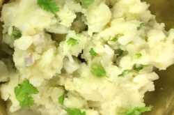 aaloo pitika is a signature dish in assamese cuisine