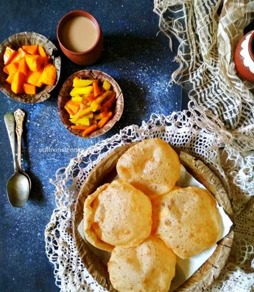 Bengali Phulko Luchi With Aloo & Kumro Chorchori