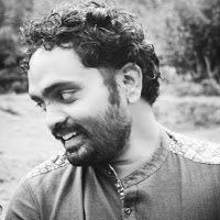 Book Spotlight : The Bluemoon Day By Santhosh Sivaraj.