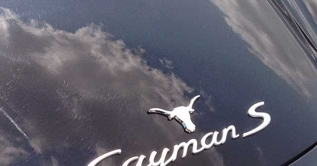 Cars Logo And Front View With Clouds