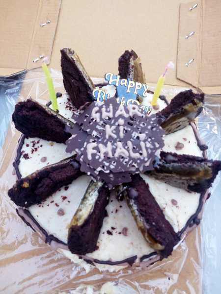 Chocolate Cake With Peanut Butter Frosting Topped With Caramelised Chocolate Cake Slices