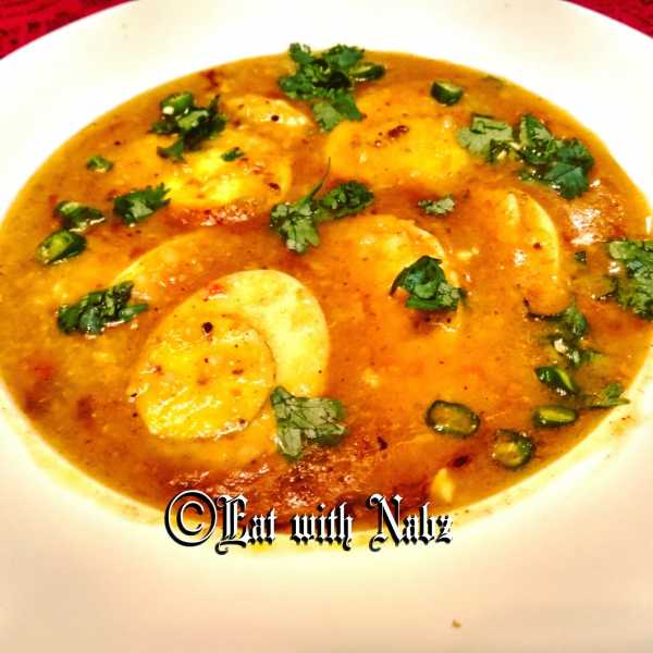 Dim-Daal ( Boiled Eggs Cooked In Spiced Lentil)