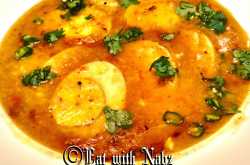 Dim-Daal ( Boiled eggs cooked in spiced Lentil)