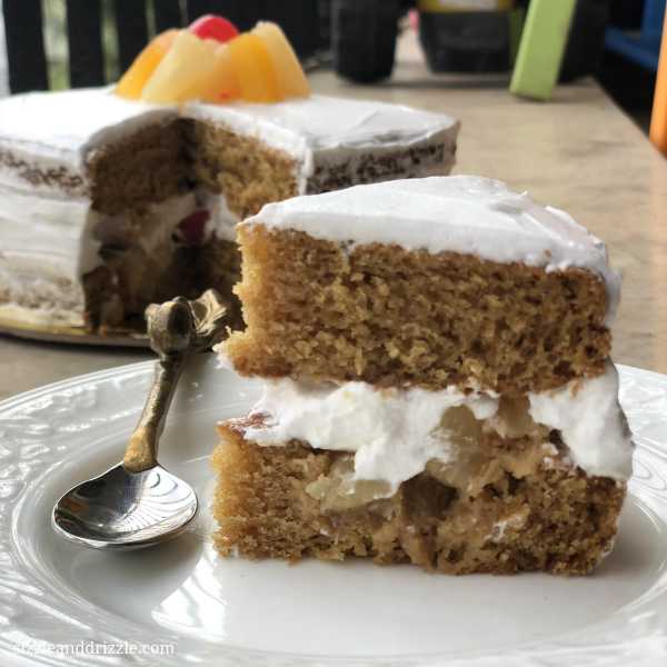 Eggless Saffron Cake With Fruits And Cream