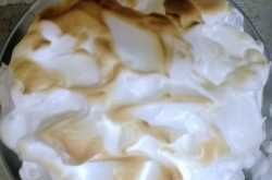 Flaming Chocolate Whiskey Cake with a Meringue Icing