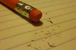 How does an eraser rub pencil marks?