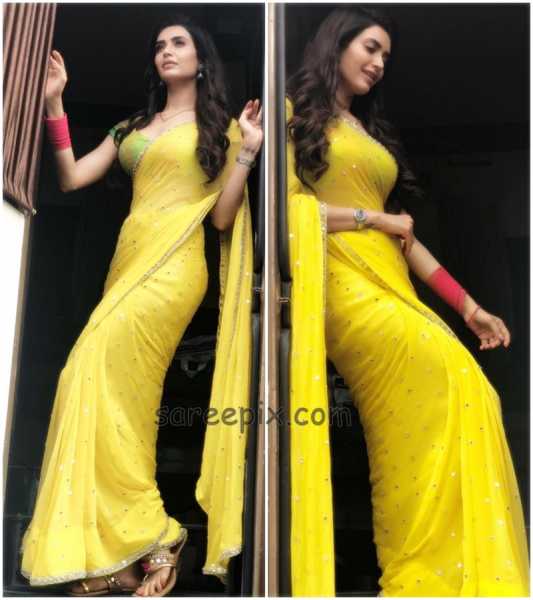 Karishma Tanna In Yellow Transparent Saree