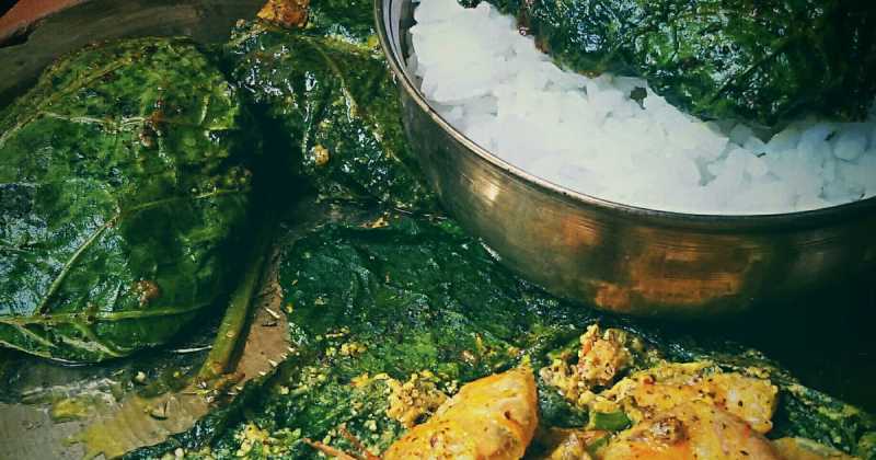 Lau Patae Chingri Paturi (Prawns Cooked In Bottle Gourd Leaf)