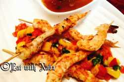 Lemon pepper grilled prawn, Mango chili salsa, Prawn head jus