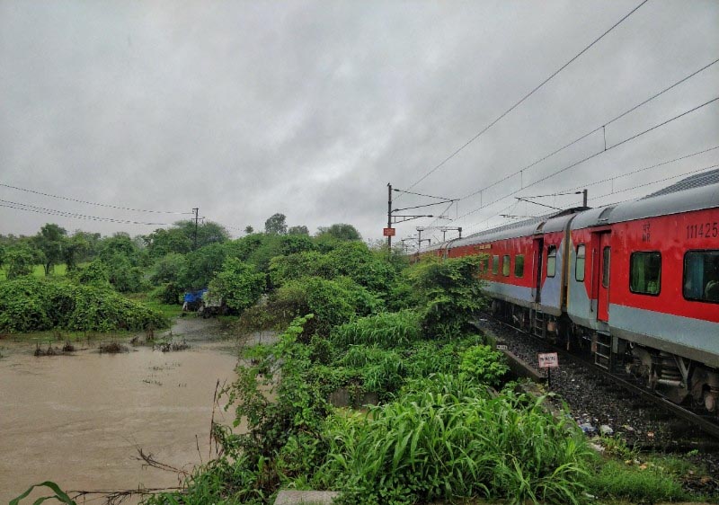 Life Across A Waterlogged Bridge, Mumbai Monsoons | Maproute Travel Blog