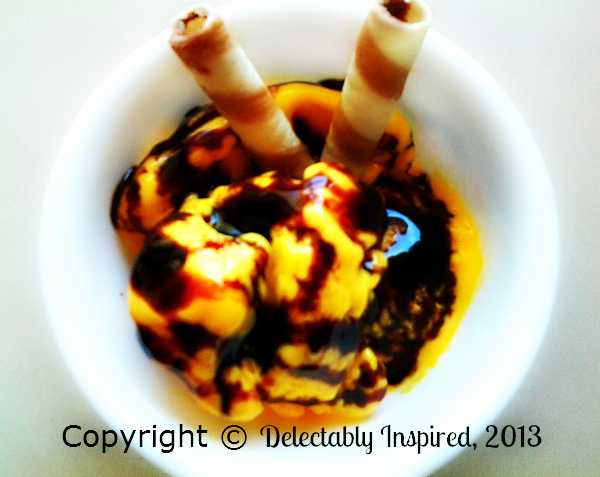 Mango Ice Cream Topped With Chocolate Sauce