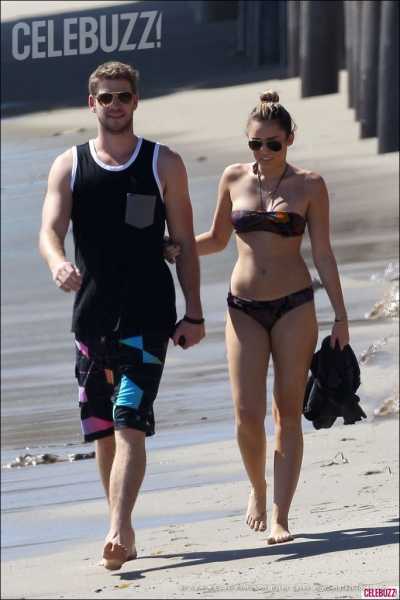 Miley Cyrus In A Bikini With Liam Hemsworth In Malibu