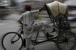 Million Dollar Smile of Rickshaw Puller