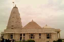 Pink bangles and mirrored skirts
