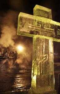 RUSSINA SPLUNGE INTO ICY WATER FOR EPIPHANY