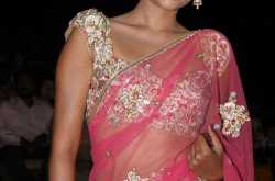 South actress Bindu Madhavi looking cute in a pink see through saree latest images
