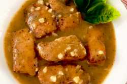 Stir Fried Salmon cooked in Orange and Garlic Sauce 