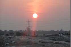 Sun Setting on the banks of Tunga River.