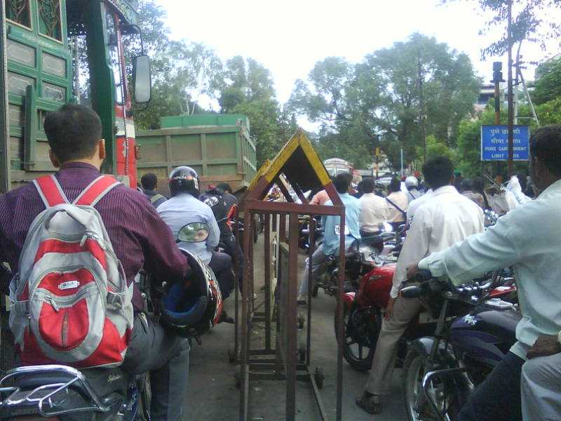 This Is How The Punekas Stand At Railway Crowssing.