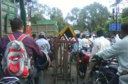 This is how the Punekas stand at railway crowssing.