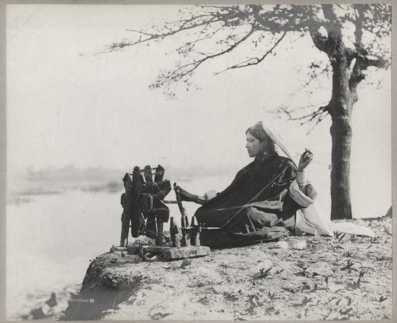 Woman Spinning Cotton - C1900